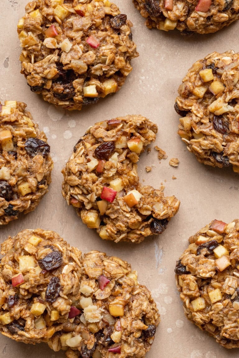 Apple oatmeal breakfast cookies, a bite missing from one.