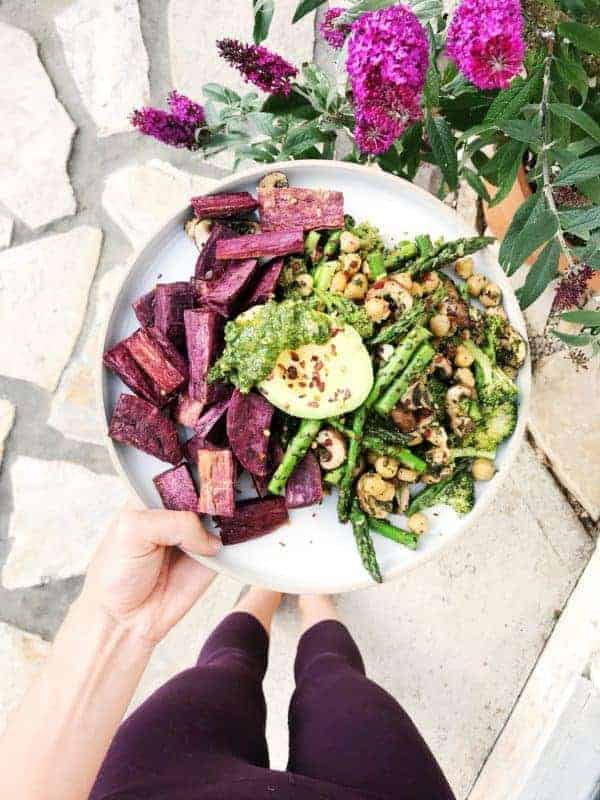 Overhead view of a healthy salad on a white plate