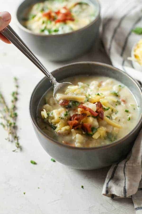 Loaded Cheesy Cauliflower Soup in a bowl 