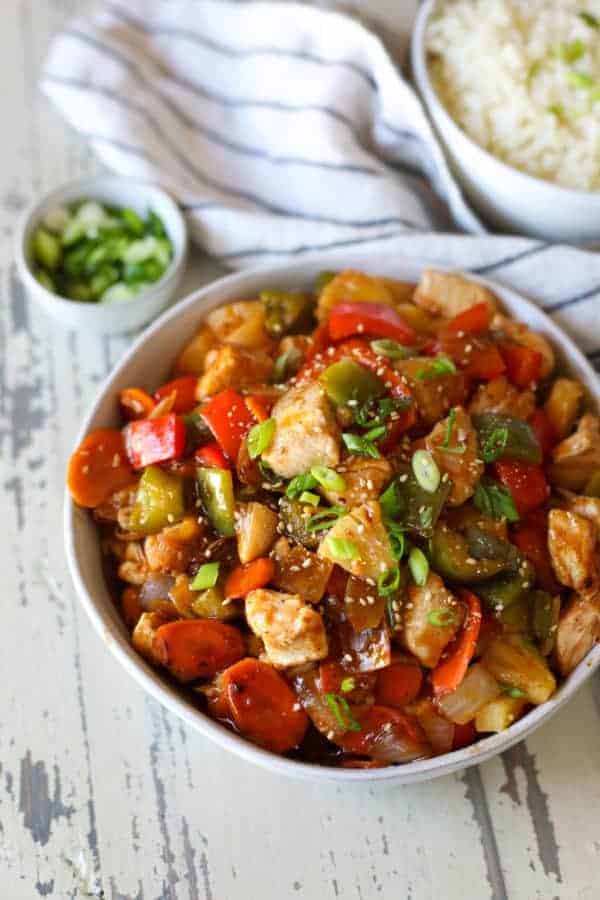 Overhead view of Skillet Sweet and Sour Chicken in a white bowl