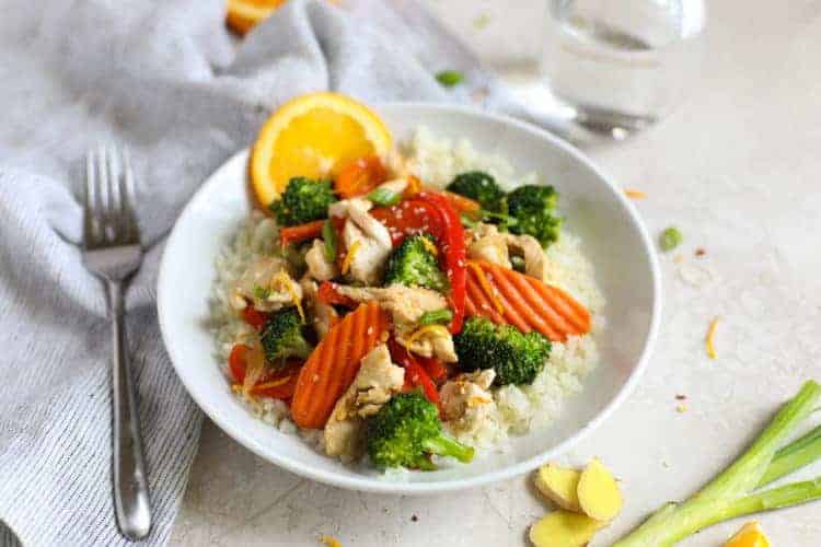 Orange-Ginger Chicken Stir Fry on a white plate