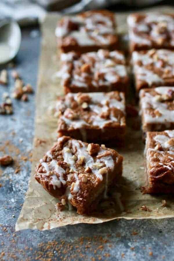 Paleo Pumpkin Pie Bars cut into squares on parchment paper