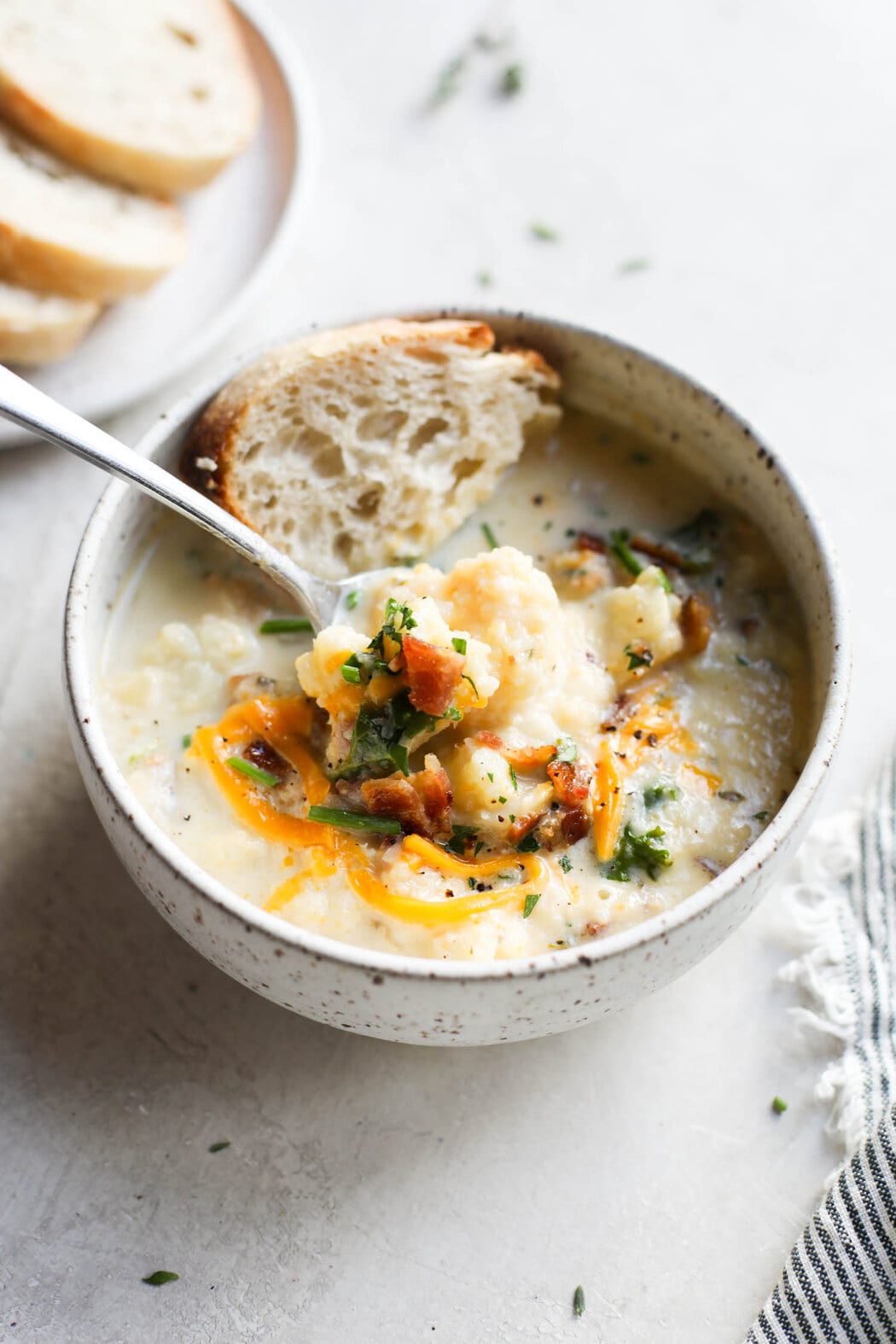 https://therealfooddietitians.com/wp-content/uploads/2018/10/Loaded-Cauliflower-Soup-20-of-20.jpg