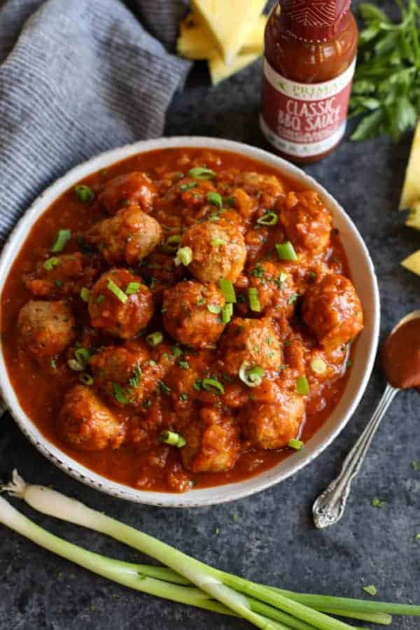 Overhead view of Pineapple BBQ Chicken Meatballs in a white bowl