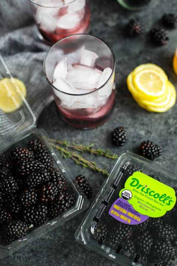 Overhead view of the ingredients for Blackberry Lemon Thyme Sparkler
