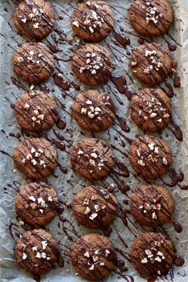 Overhead view of Paleo Soft Batch Ginger Molasses Cookies on parchment paper