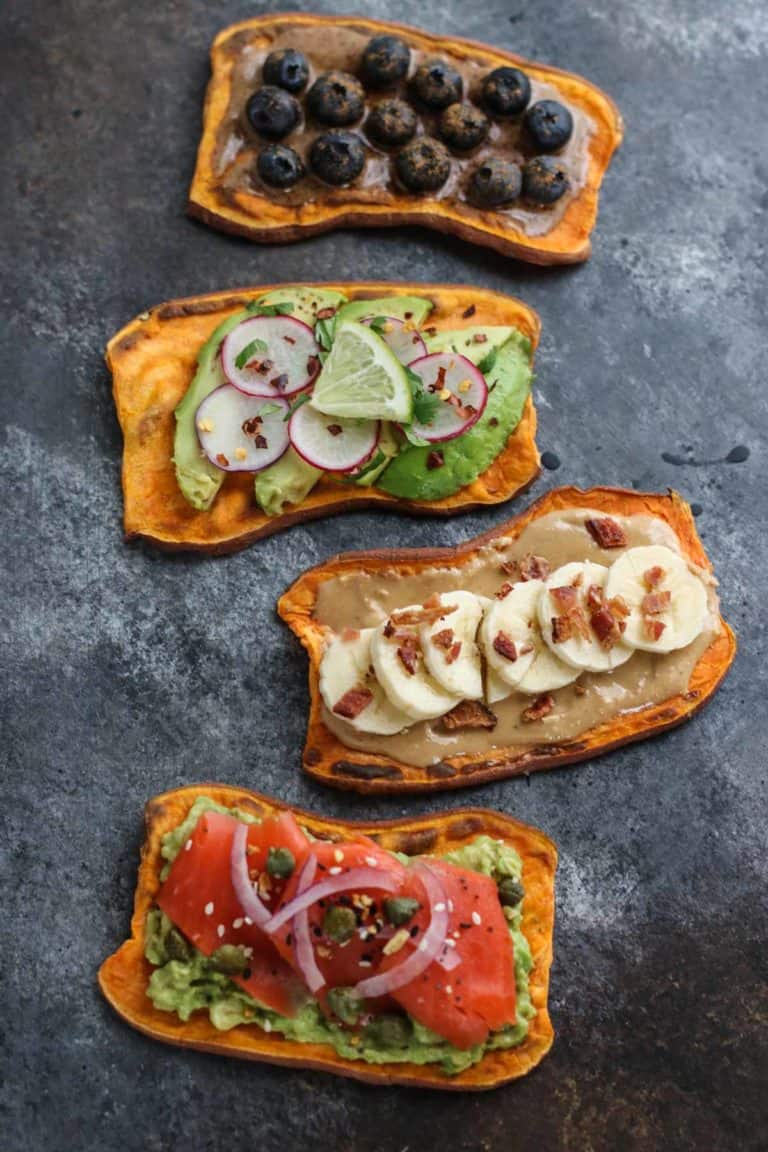 Baked Sweet Potato Toast with a variety of toppings including sweet and savory options. 