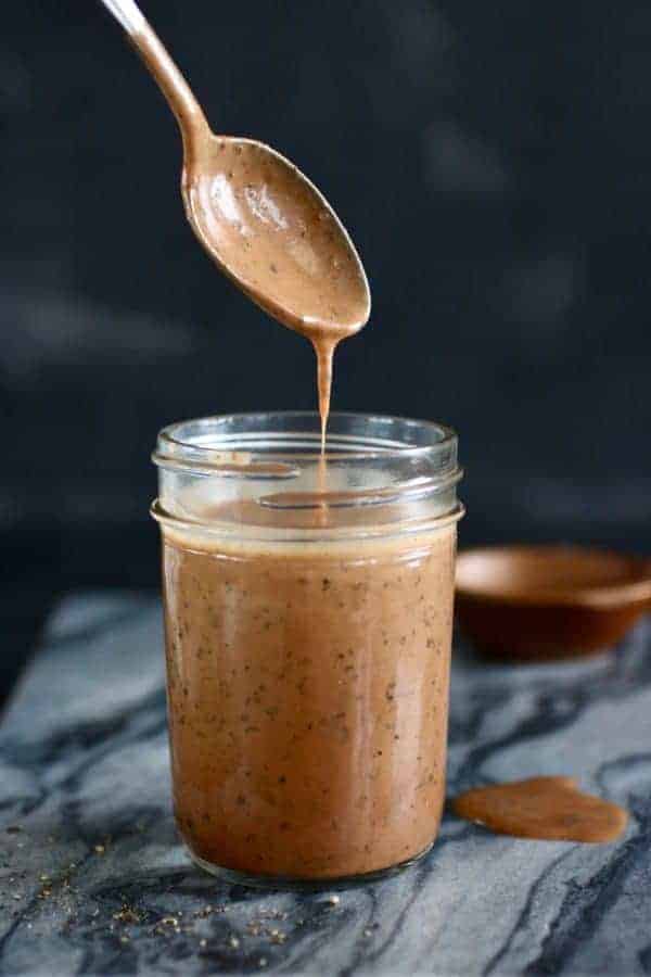 Photo of dressing in a mason jar for the the BBQ Ranch Turkey Veggies Skillet