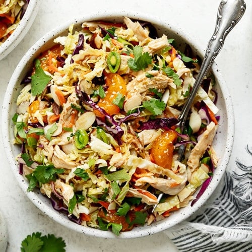 Overhead view Chinese Chicken Salad in large bowl.