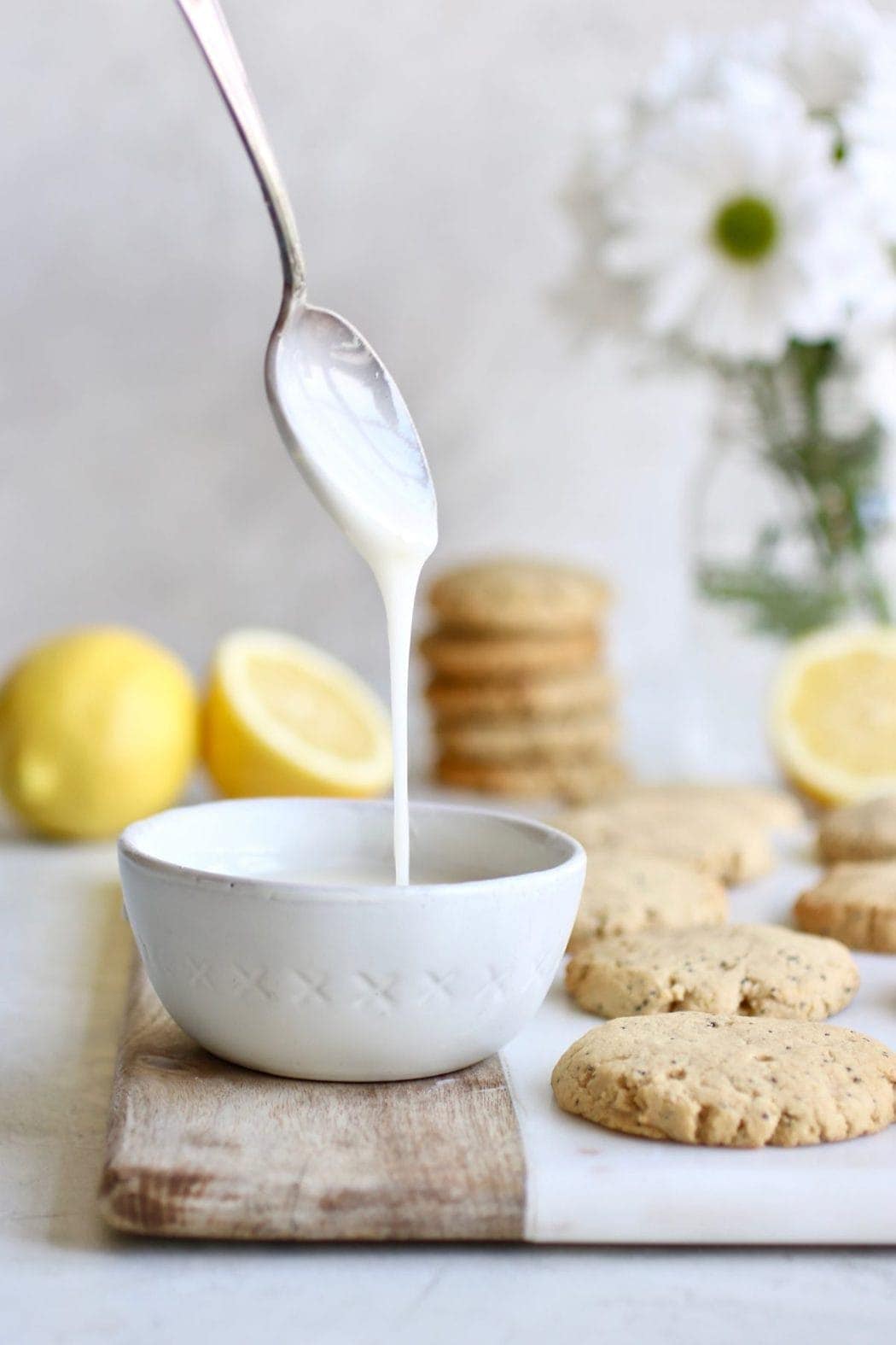 Photo of the lemon glaze that will be drizzled on the Paleo Lemon Poppy Seed Cookies. 