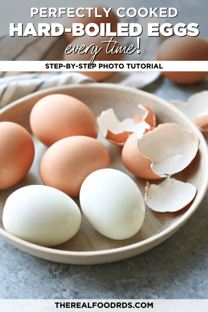 Easy-peel hard-boiled eggs in a low bowl, some freshly peeled.