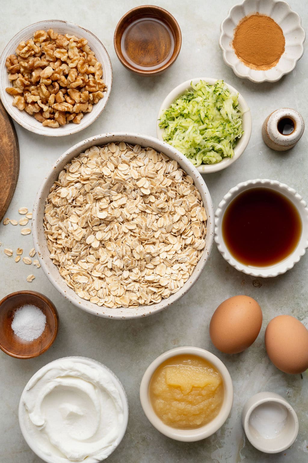 Ingredients to make baked zucchini oatmeal cups.