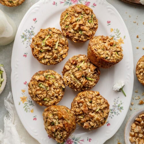 A plate of seven baked oatmeal cups.