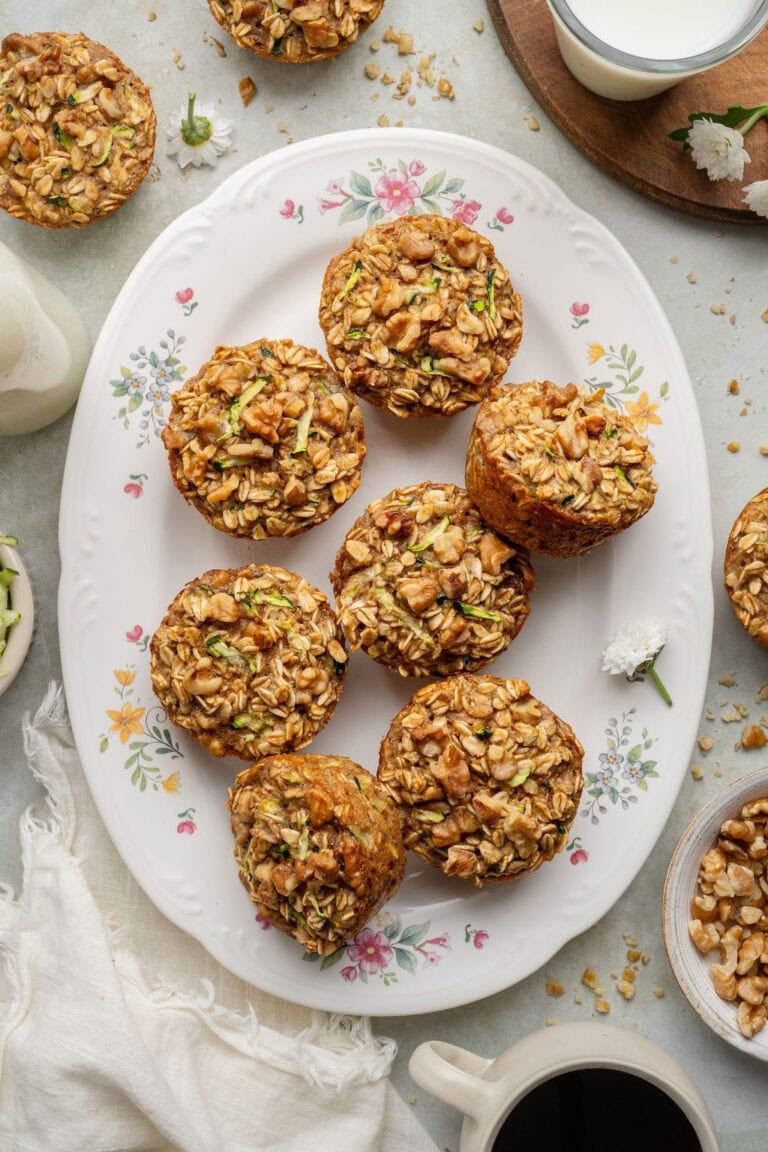 A plate of seven baked oatmeal cups.