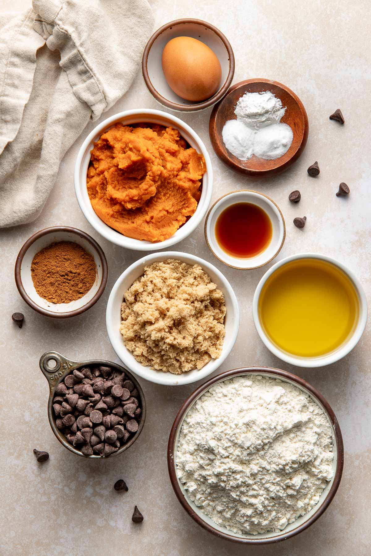 Ingredients to make pumpkin chocolate chip bars.