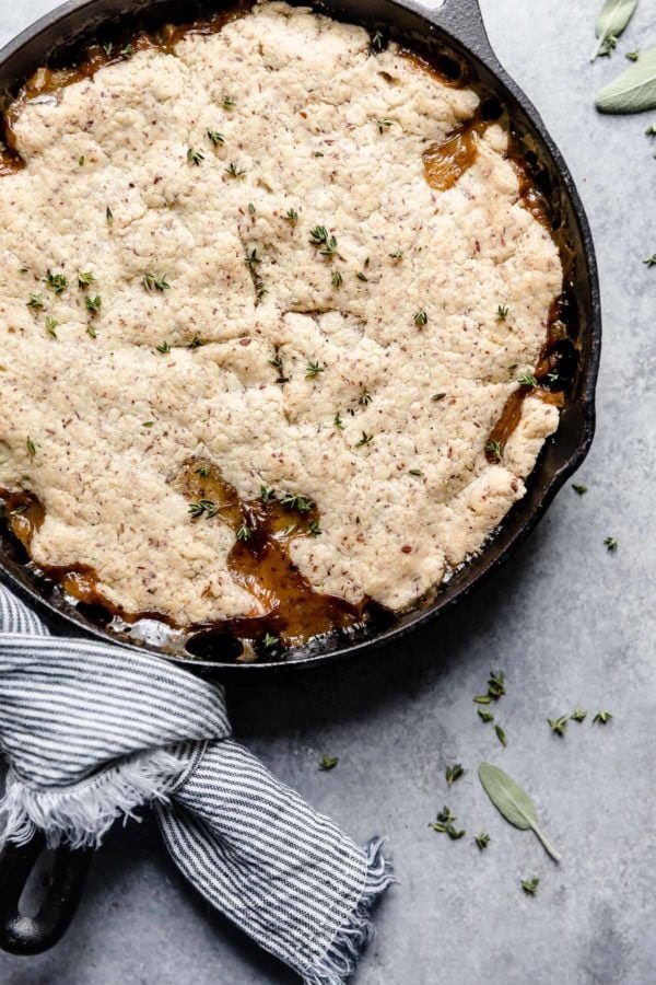 An overhead view of a cast iron skillet filled with Paleo Turkey Pot Pie. 