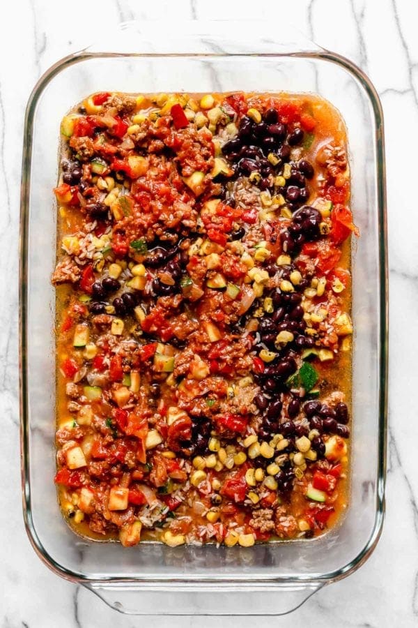 Taco casserole filling in a casserole dish.