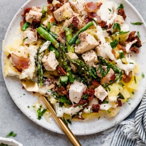 Close up view of Creamy Chicken Spaghetti Squash with Bacon and Asparagus