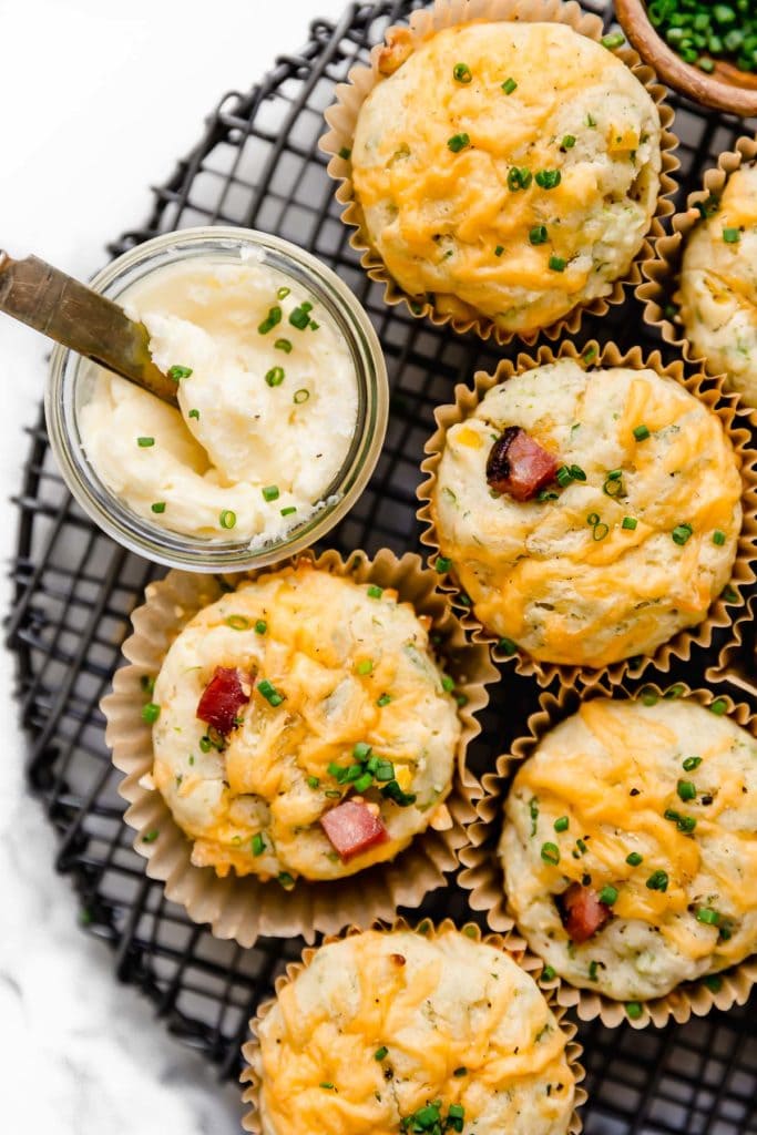 Savory Ham & Cheese Muffins on a cooling rack.