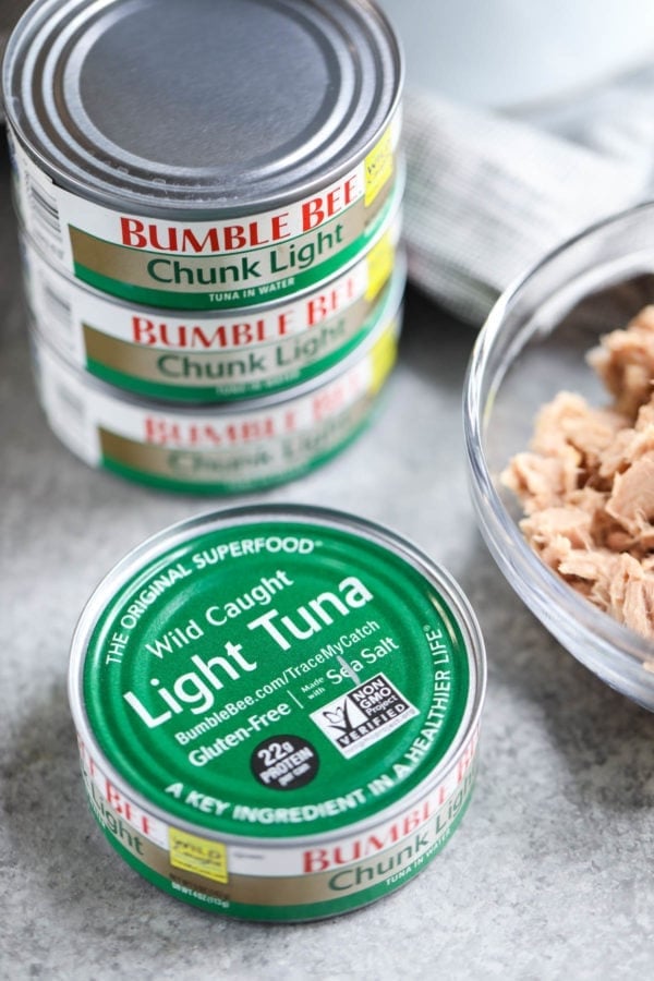 A stack of cans of Bumble Bee Chunk Light tuna in water 