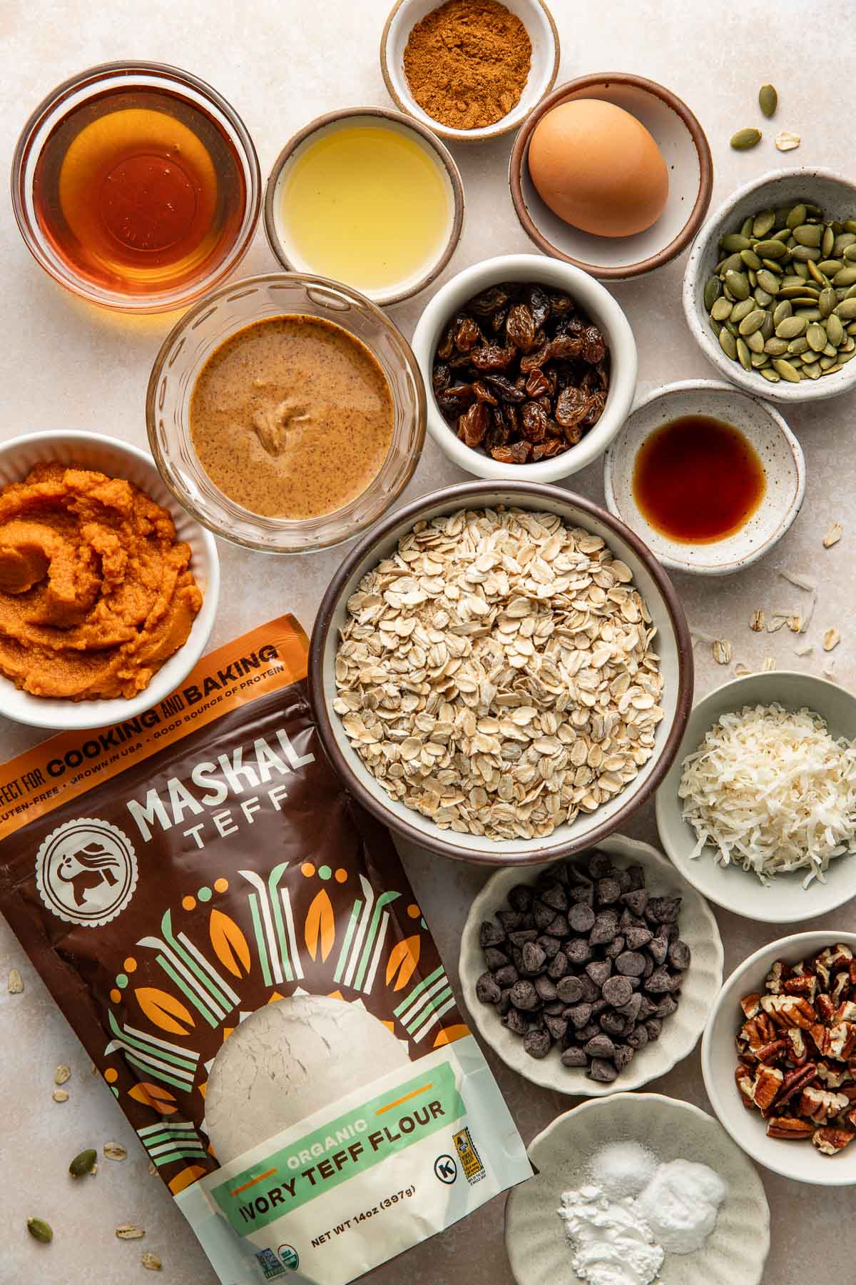 Ingredients to make pumpkin breakfast cookies with teff flour.