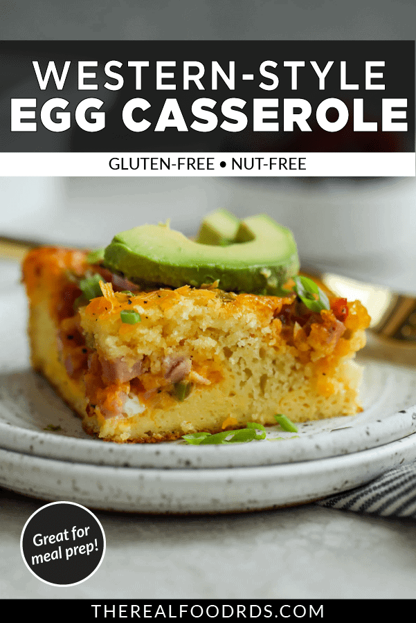 Close up view of Western-style egg casserole to show the texture and topped with sliced avocado.