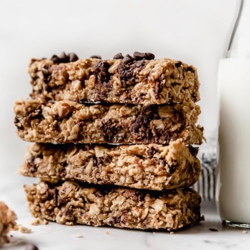 A stack of homemade granola bars with chocolate chips as part of 6 freezer breakfast recipes