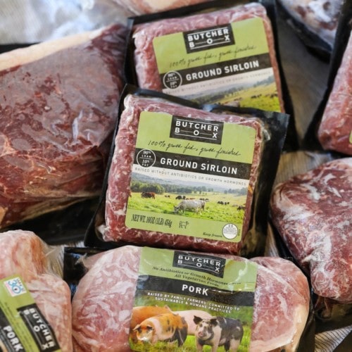 Several packages of meat with Butcher Box logo