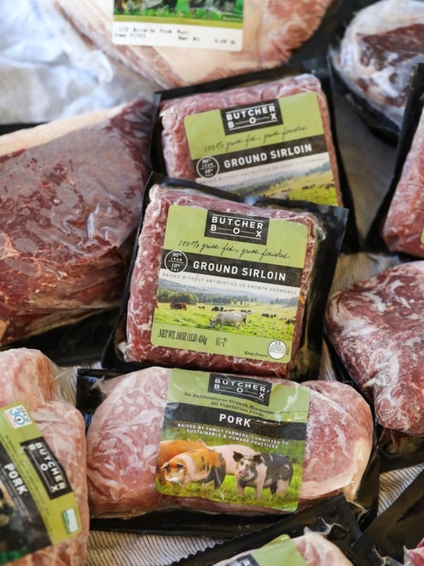 Several packages of meat with Butcher Box logo
