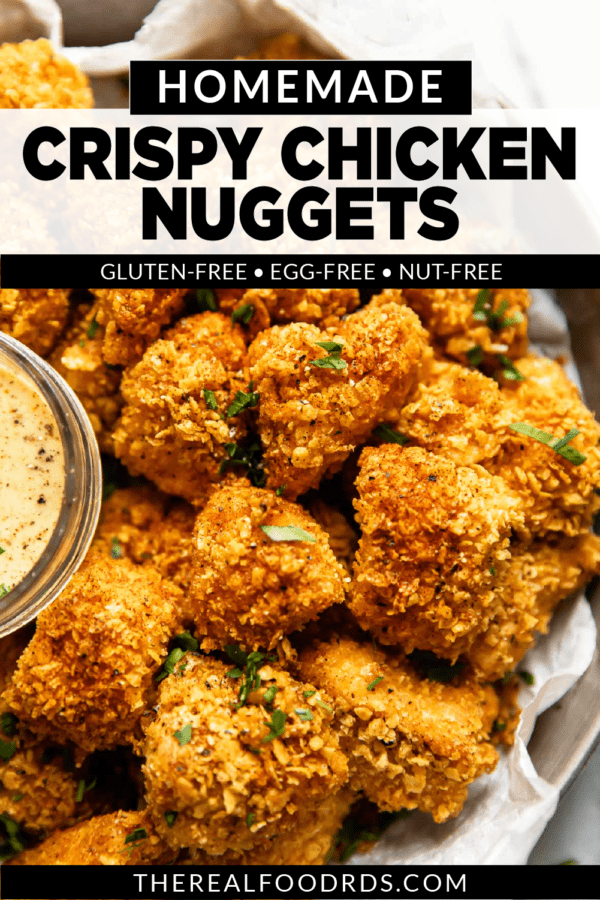 Homemade Crispy Chicken Nuggets piled high on a serving platter | Pinterest pin