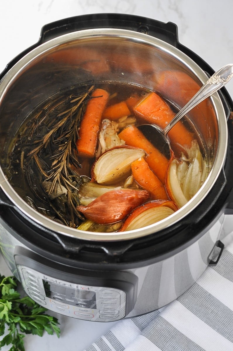 Freshly made homemade chicken bone broth in an Instant Pot 