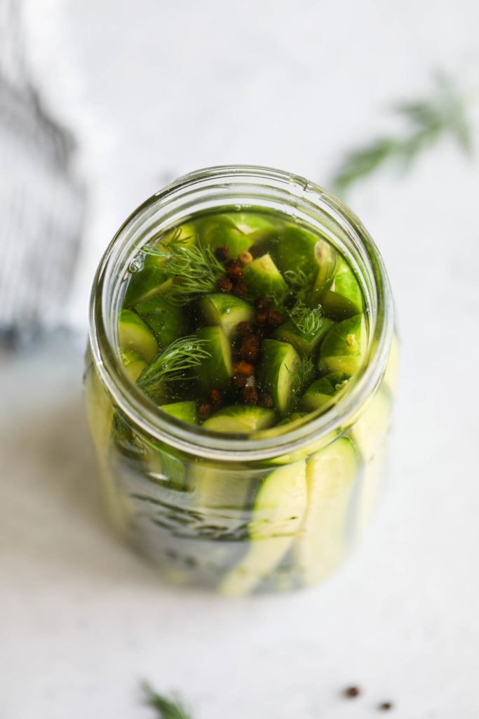Dill pickle spears in a mason jar