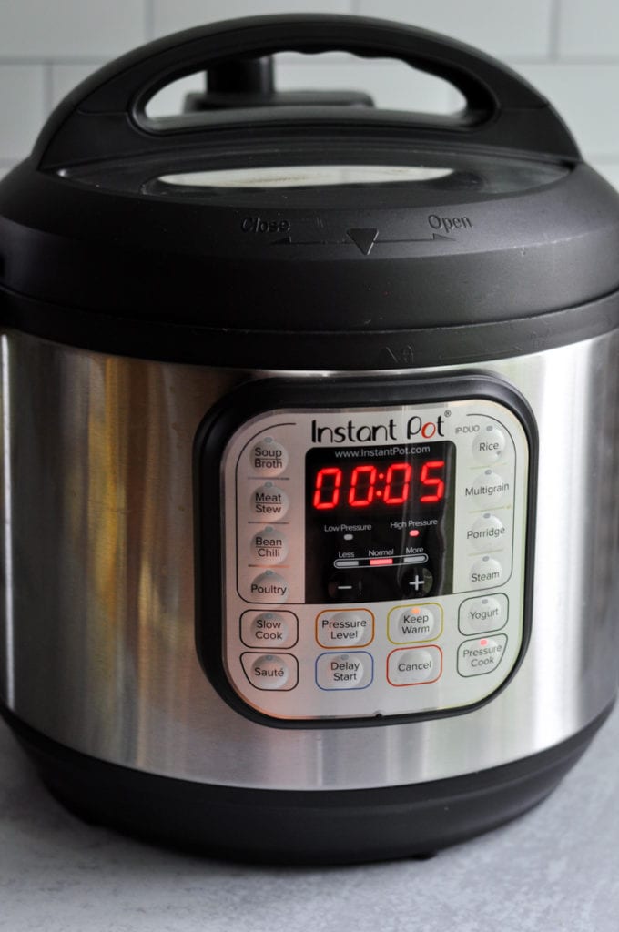 An Instant Pot with 5 minutes on the high pressure setting