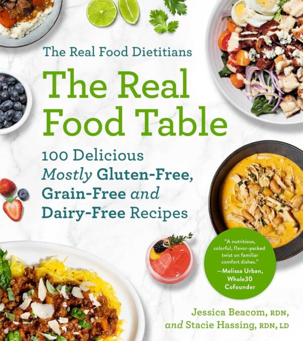 The front cover of The Real Food Table paperback cookbook.