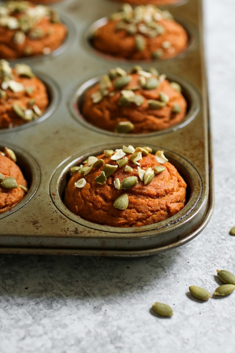 Pumpkin Protein Muffins in a mufin tin.
