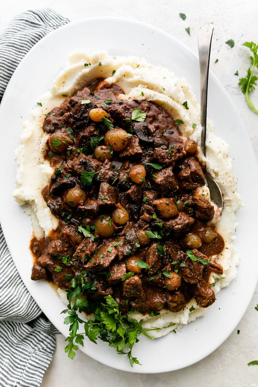 beef tips with gravy served over mashed potatoes