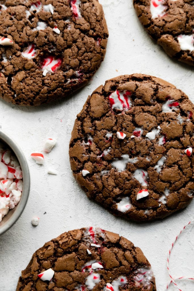 Peppermint brownie Christmas cookies laying on a white counter