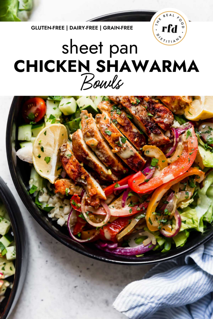 Overhead view of chicken shawarma bowls with cauliflower rice, roasted veggies, sliced chicken shawarma, and drizzled with cilantro-lime dressing.