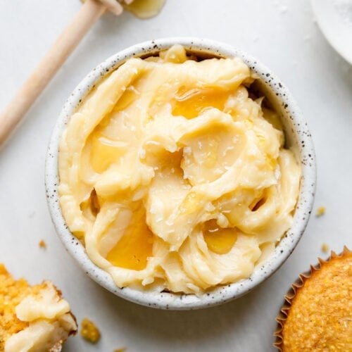 Overhead view whipped honey butter in small bowl.