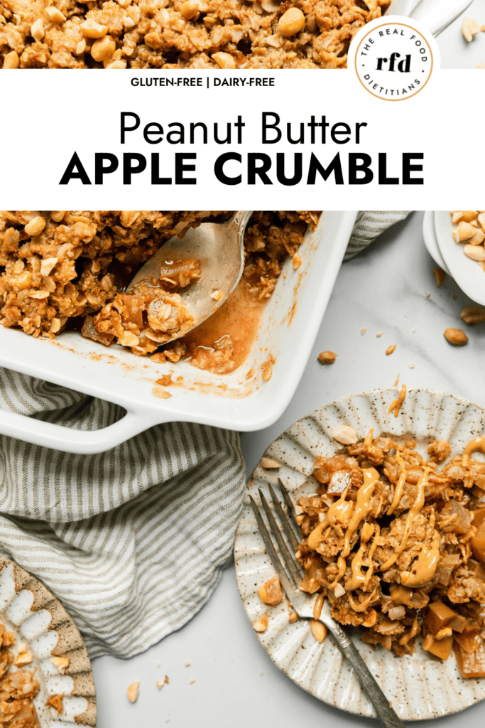 A serving of peanut butter apple crumble on plate drizzled with peanut butter, a white baking dish filled with apple crumble with oat topping.