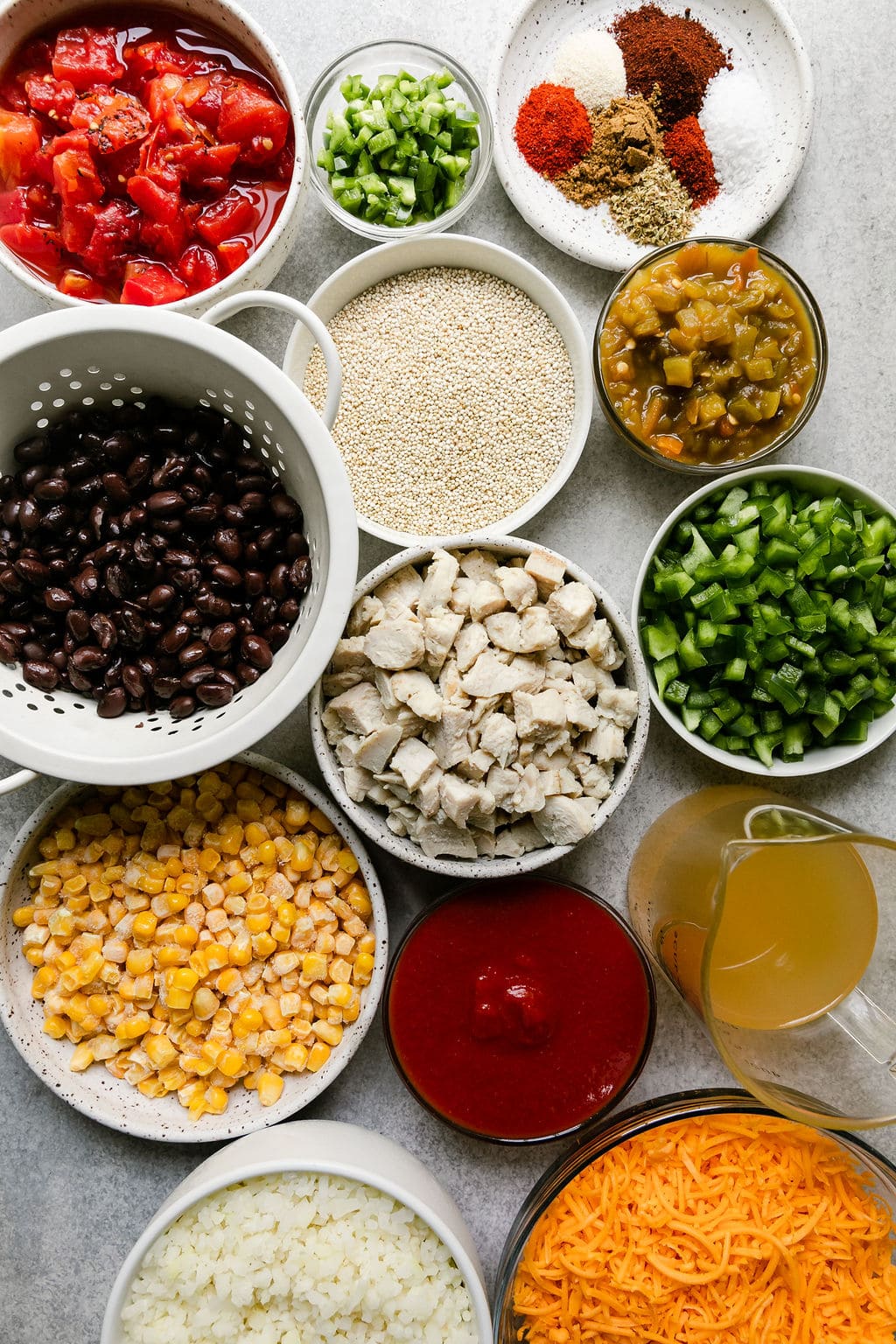 A variety of ingredients for Southwest Chicken Quinoa Casserole 
