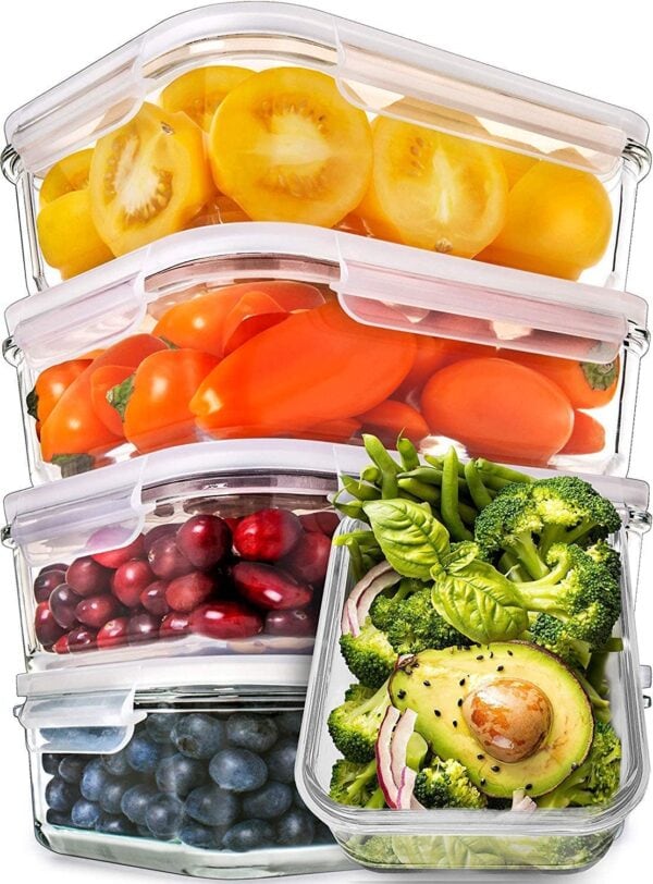 Clear glass meal prep containers filled with colorful fruits and vegetables