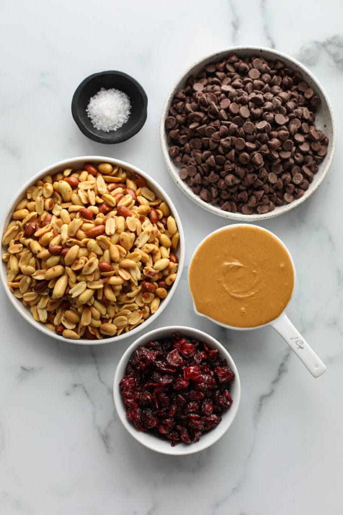 Overhead view all ingredients for crockpot peanut clusters.