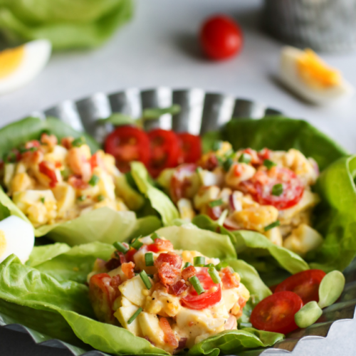 BLT egg salad on lettuce leaves, on silver platter