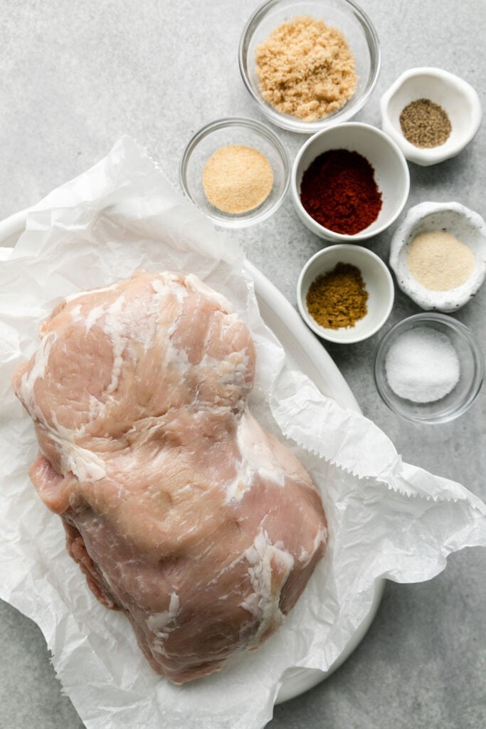 Overhead view all ingredients for grilled pork loin with easy rub arranged in bowls.