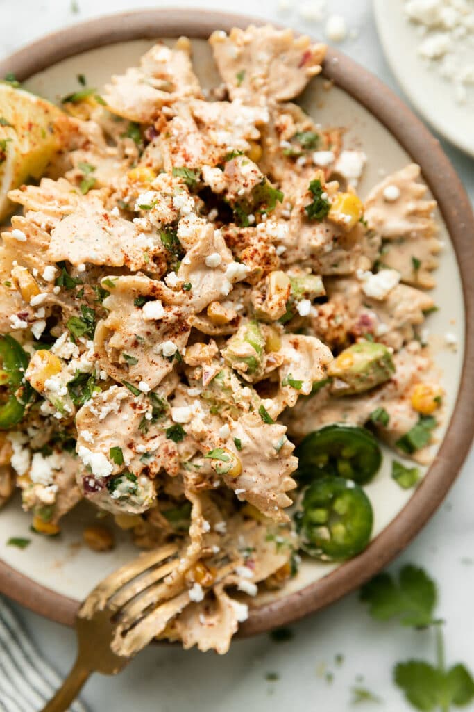 Mexican Street Corn Pasta Salad served in stone bowl