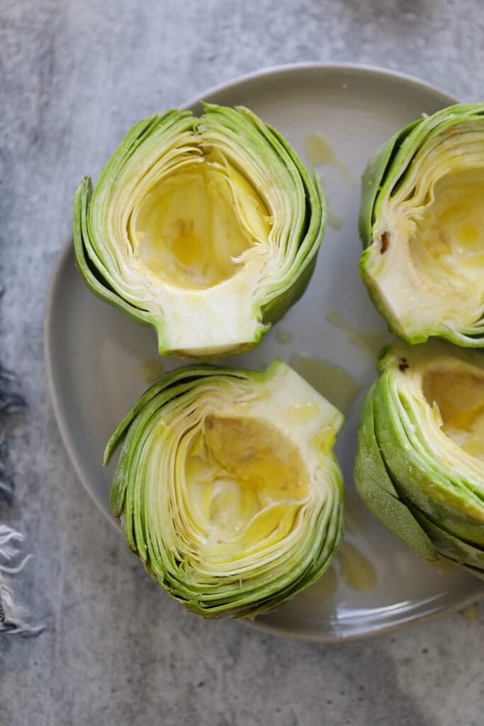 Prepped artichokes about to go into the air fryer.