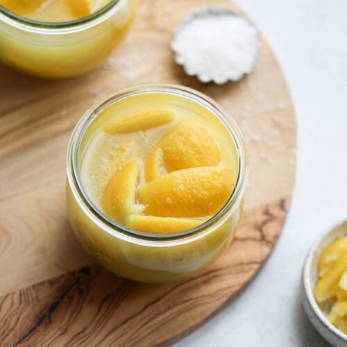 Preserved lemons in small glass jar