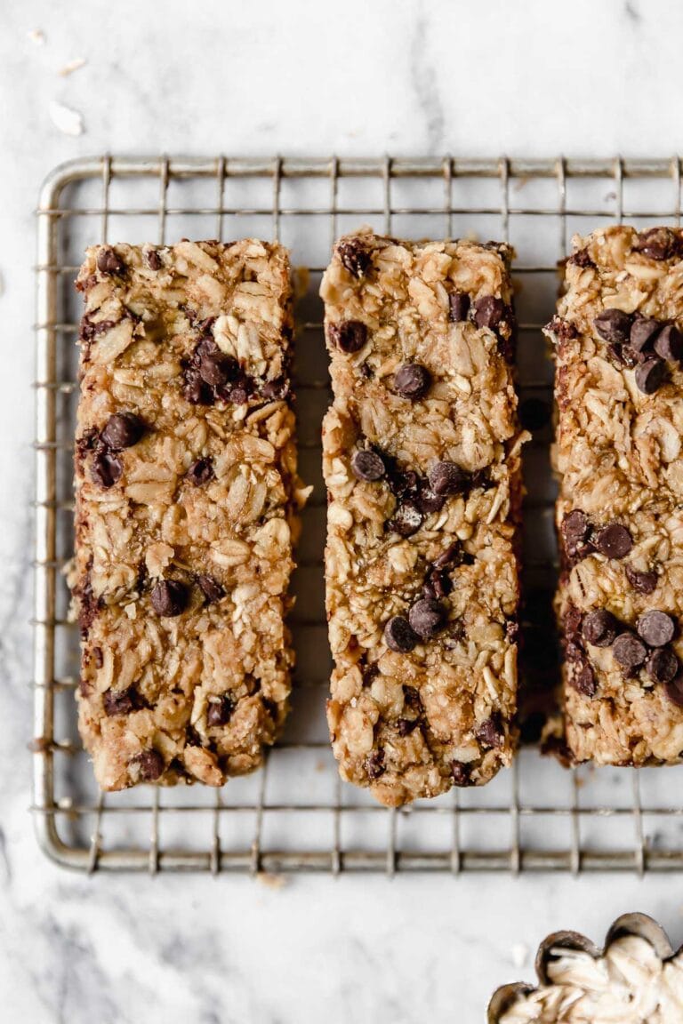 Overhead view of 5-ingredient peanut butter granola bars on a wire cooling rack. 