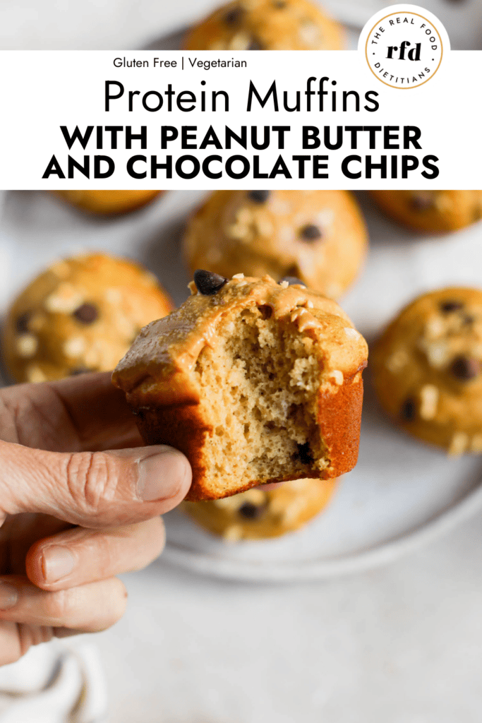 A peanut butter protein muffin with bite taken out to show inside texture